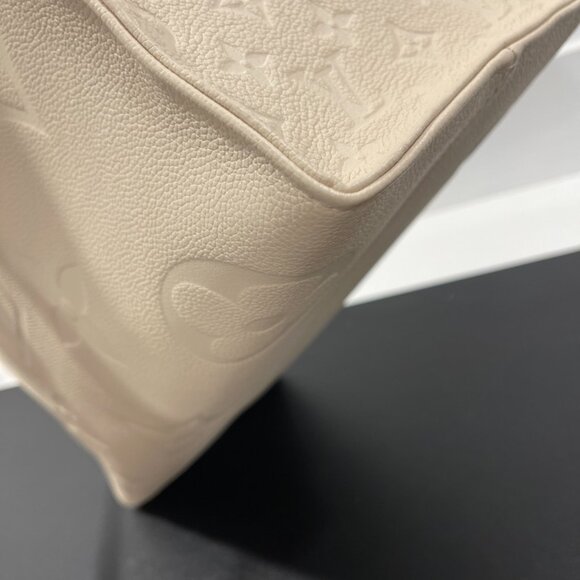Louis Vuitton On The Go GM Monogram Cream Empreinte Leather (127536) - Picture 8 of 14